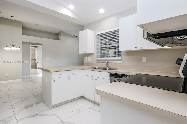 138 SW Bedford Rd, Port St Lucie, FL 34953 - kitchen with a peninsula, a sink, recessed lighting, light countertops, and light marble finish flooring