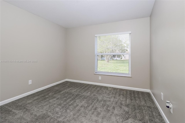 138 SW Bedford Rd, Port St Lucie, FL 34953 - unfurnished room with dark colored carpet and baseboards
