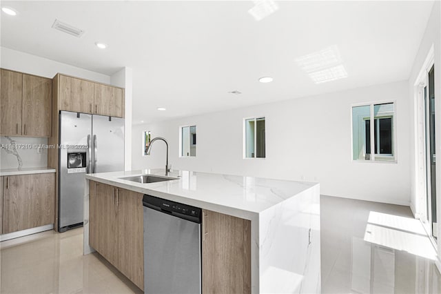 22481 SW 125th Ave Unit A, Miami, FL 33170 - kitchen with stainless steel appliances, a sink, modern cabinets, light tile patterned floors, and recessed lighting