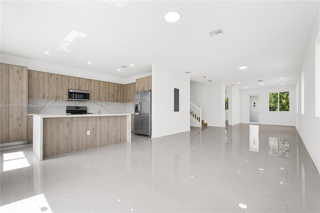 22481 SW 125th Ave Unit A, Miami, FL 33170 - kitchen featuring appliances with stainless steel finishes, modern cabinets, open floor plan, light tile patterned flooring, and recessed lighting