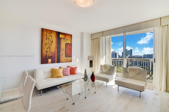 1755 E Hallandale Beach Blvd Unit 1504E, Hallandale Beach, FL 33009 - living area with expansive windows and a skyline view