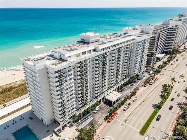 5601 Collins Ave Unit 923, Miami Beach, FL 33140 - drone / aerial view of extended coastline and apartment complex / building