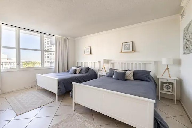 5601 Collins Ave Unit 923, Miami Beach, FL 33140 - bedroom with light tile patterned flooring