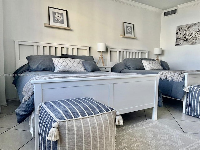 5601 Collins Ave Unit 923, Miami Beach, FL 33140 - bedroom featuring crown molding and tile patterned flooring