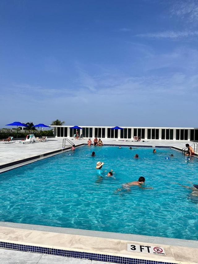 5601 Collins Ave Unit 923, Miami Beach, FL 33140 - community pool with a patio