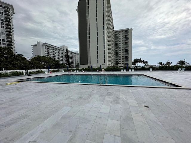 5601 Collins Ave Unit 923, Miami Beach, FL 33140 - community pool featuring a patio area
