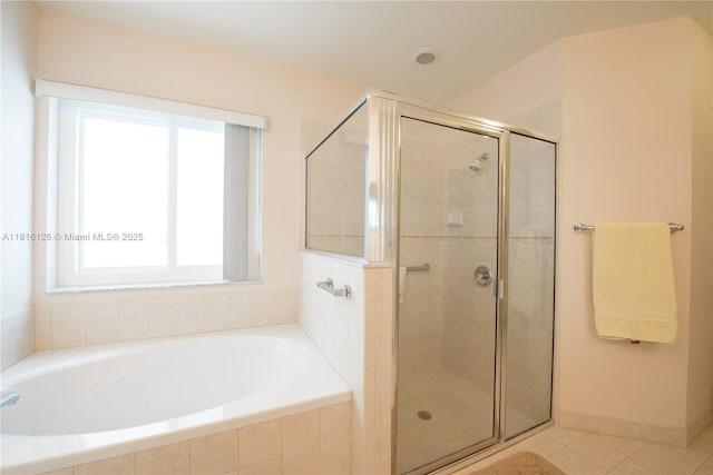 5402 NW 110th Ave, Doral, FL 33178 - bathroom featuring a garden tub, a stall shower, and tile patterned flooring