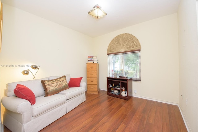 5402 NW 110th Ave, Doral, FL 33178 - living room featuring wood finished floors and baseboards