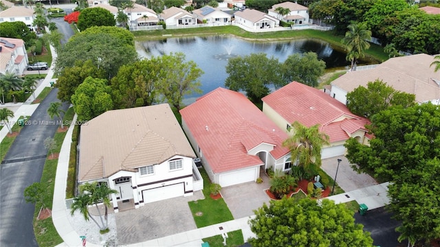 5402 NW 110th Ave, Doral, FL 33178 - aerial perspective of suburban area with a large body of water