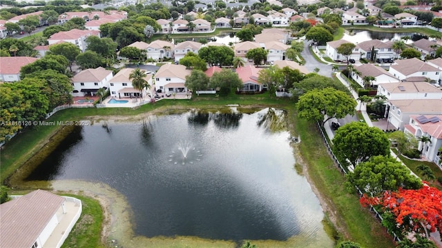 5402 NW 110th Ave, Doral, FL 33178 - aerial perspective of suburban area with a large body of water