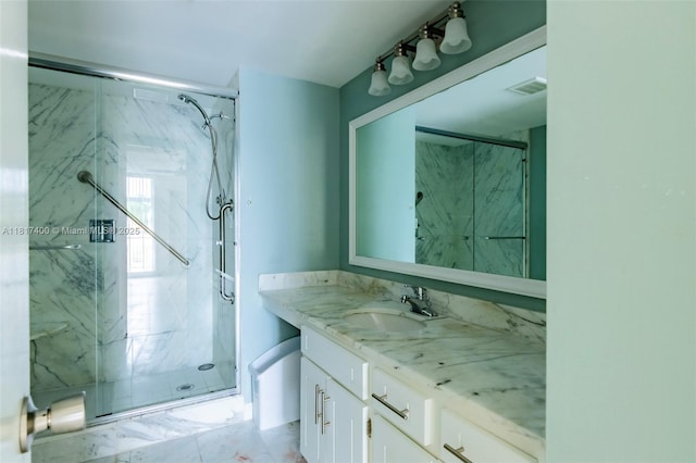 1360 S Ocean Blvd Unit 304, Pompano Beach, FL 33062 - bathroom with vanity, a marble finish shower, and marble finish floors