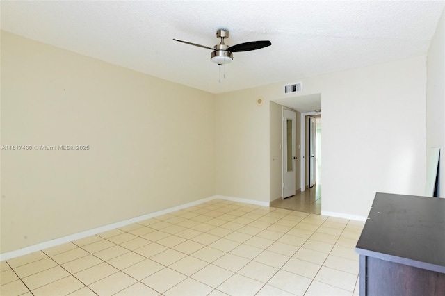 1360 S Ocean Blvd Unit 304, Pompano Beach, FL 33062 - unfurnished room with a ceiling fan, light tile patterned flooring, and baseboards