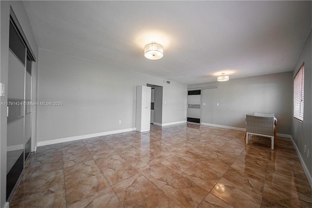 11020 SW 55th St, Miami, FL 33165 - empty room featuring marble finish floors and baseboards