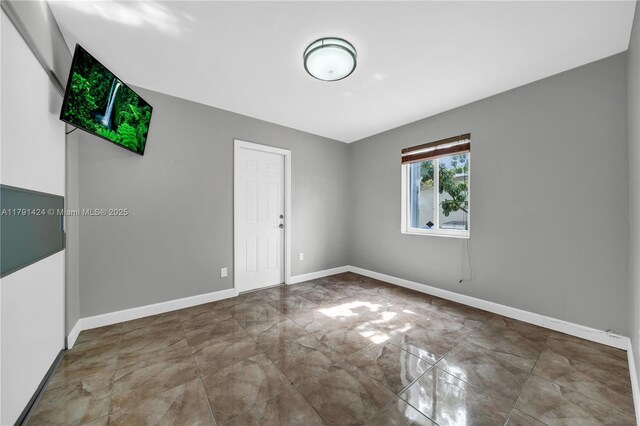 11020 SW 55th St, Miami, FL 33165 - unfurnished room with baseboards