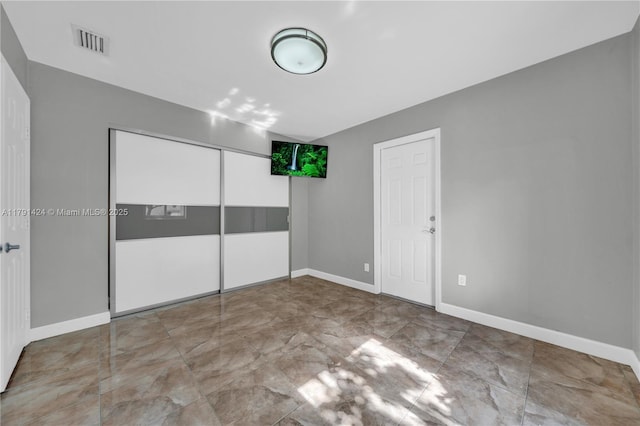 11020 SW 55th St, Miami, FL 33165 - unfurnished bedroom featuring a closet and baseboards