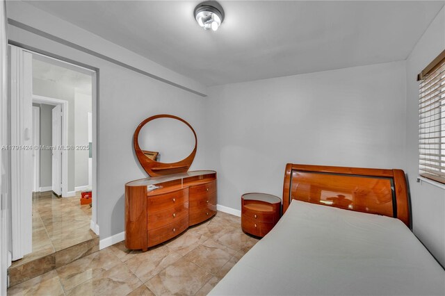 11020 SW 55th St, Miami, FL 33165 - bedroom featuring baseboards