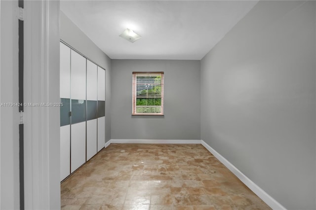 11020 SW 55th St, Miami, FL 33165 - unfurnished bedroom with baseboards and a closet