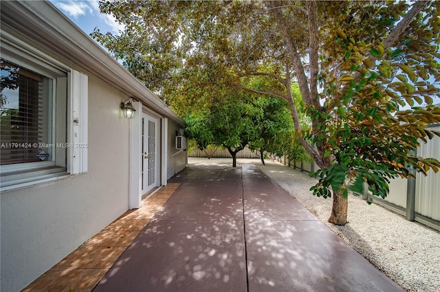 11020 SW 55th St, Miami, FL 33165 - fenced backyard with a patio area and french doors