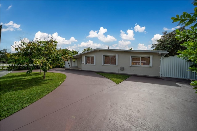 11020 SW 55th St, Miami, FL 33165 - ranch-style home featuring stucco siding, a front lawn, and driveway