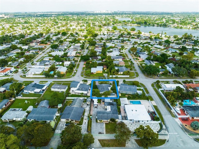 11020 SW 55th St, Miami, FL 33165 - aerial view of residential area with a large body of water and property parcel outlined