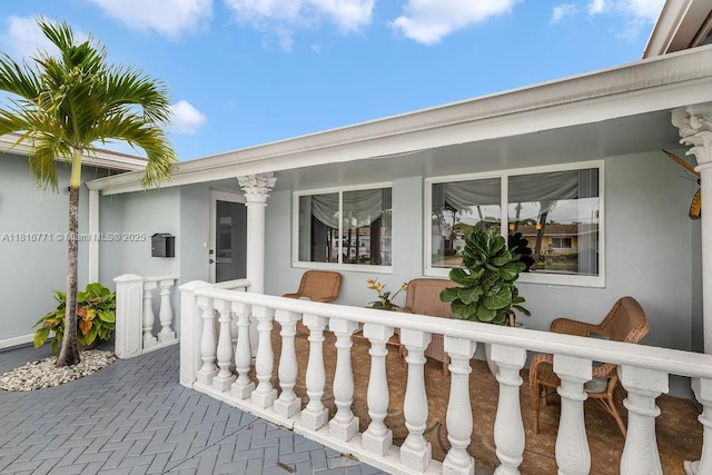 7968 Venetian St, Miramar, FL 33023 - property entrance with a porch and stucco siding