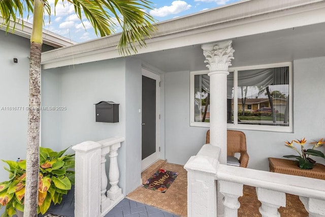 7968 Venetian St, Miramar, FL 33023 - property entrance featuring stucco siding and covered porch