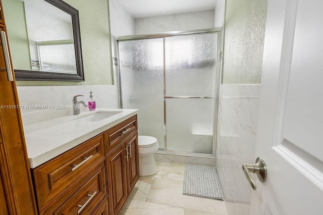7968 Venetian St, Miramar, FL 33023 - full bath featuring vanity, tile walls, toilet, a stall shower, and a wainscoted wall