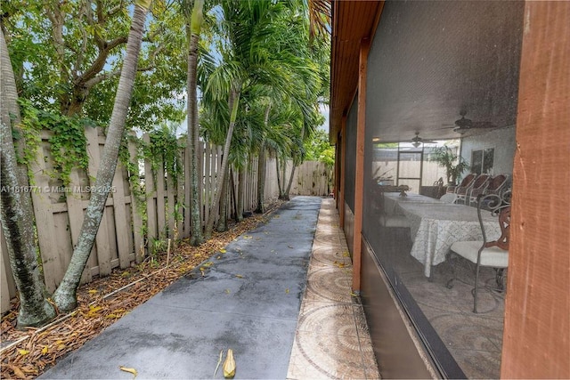 7968 Venetian St, Miramar, FL 33023 - fenced backyard featuring a ceiling fan and a patio