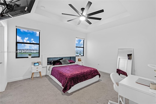10225 SW 231st Ln, Miami, FL 33190 - carpeted bedroom with a raised ceiling, baseboards, and a ceiling fan