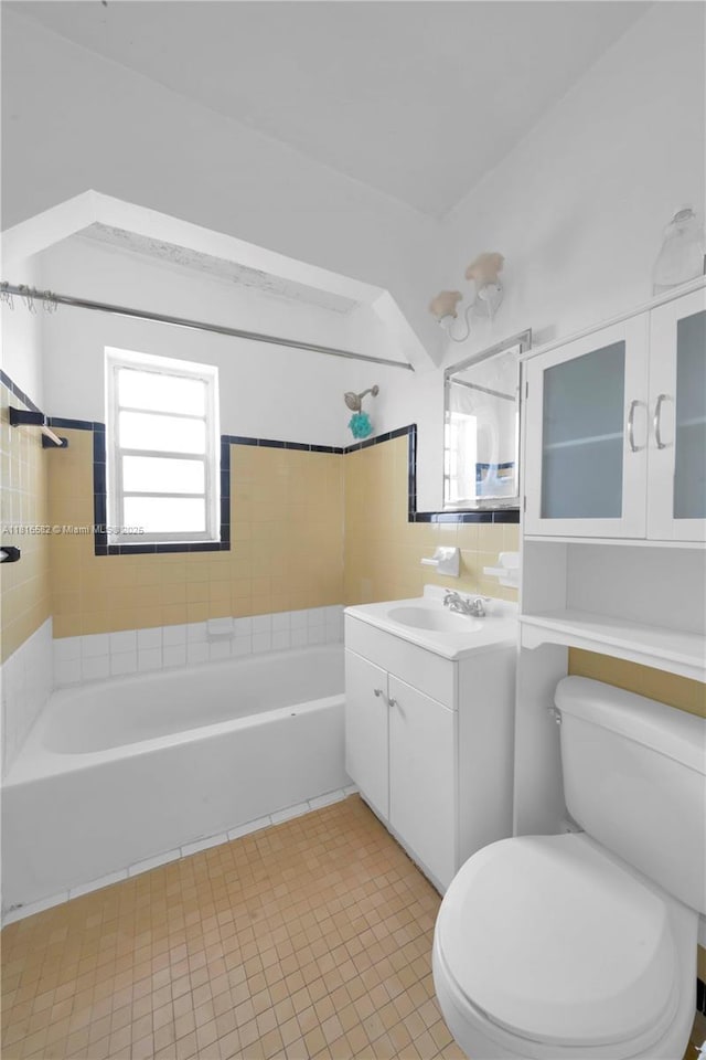 3401 SW 10th St Unit 2B, Miami, FL 33135 - full bathroom with vanity, toilet, plenty of natural light, and bathtub / shower combination
