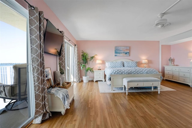 200 Wrenn St Ph 701, Plantation Key, FL 33070 - bedroom with wood finished floors and baseboards