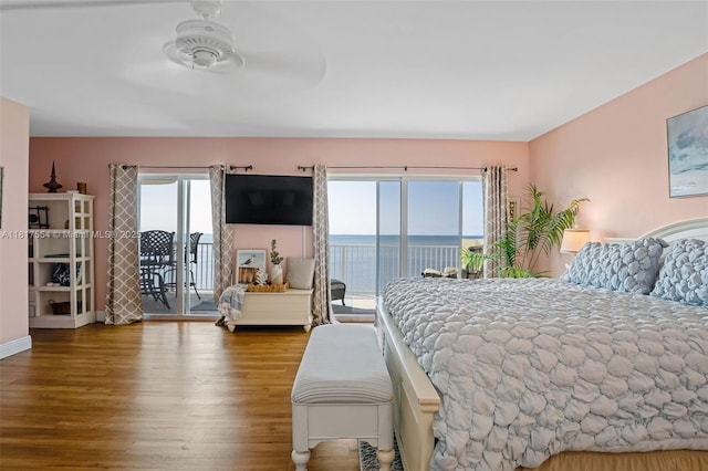200 Wrenn St Ph 701, Plantation Key, FL 33070 - bedroom with access to exterior and wood finished floors