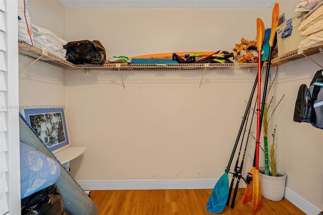 200 Wrenn St Ph 701, Plantation Key, FL 33070 - walk in closet featuring wood finished floors
