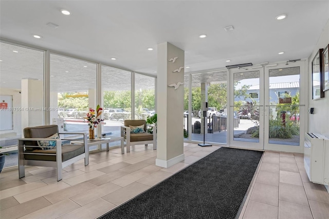 200 Wrenn St Ph 701, Plantation Key, FL 33070 - community lobby featuring expansive windows and recessed lighting