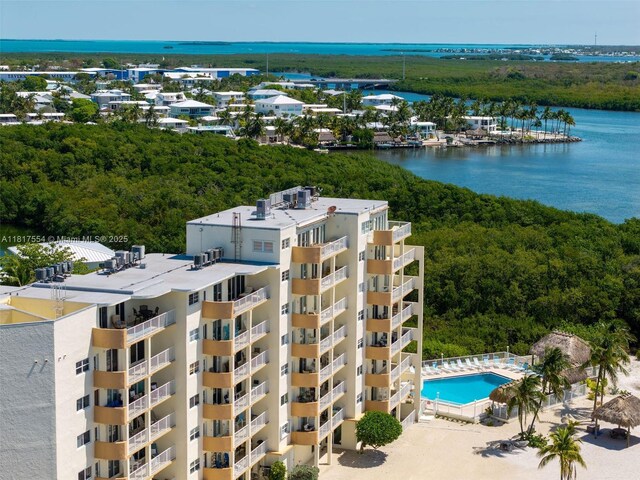 200 Wrenn St Ph 701, Plantation Key, FL 33070 - bird's eye view of a nearby body of water, a heavily wooded area, and a pool area