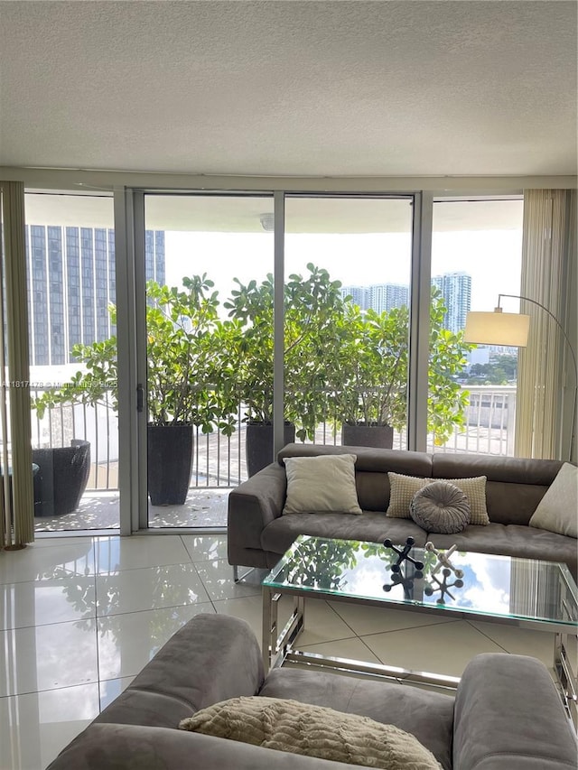 1750 N Bayshore Dr Unit 1414, Miami, FL 33132 - tiled living area featuring healthy amount of natural light and a textured ceiling
