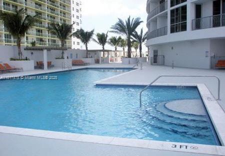 1750 N Bayshore Dr Unit 1414, Miami, FL 33132 - community pool featuring a patio area