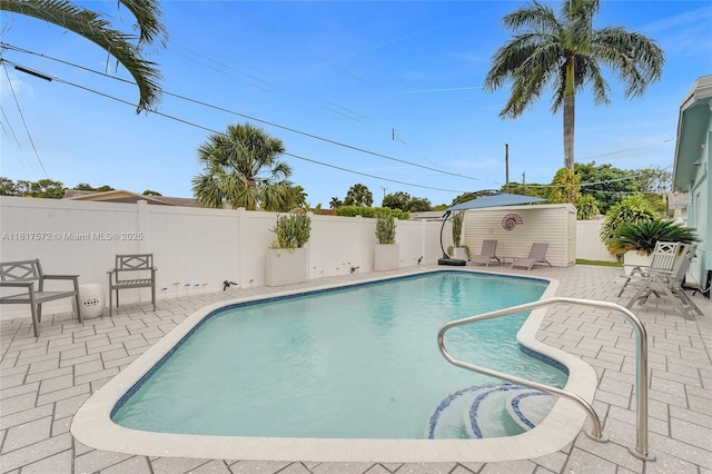 837 NW 10th Ave, Dania Beach, FL 33004 - view of swimming pool featuring a patio area and a fenced backyard