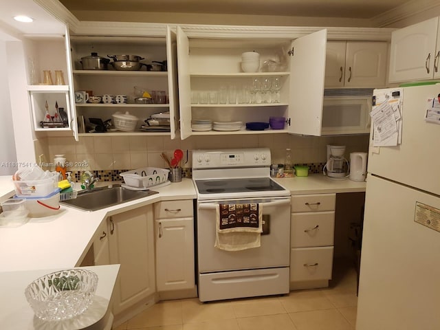 3740 Inverrary Dr Unit 3D, Lauderhill, FL 33319 - kitchen with white appliances, open shelves, a sink, light tile patterned flooring, and backsplash