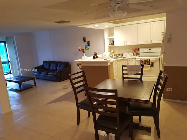 3740 Inverrary Dr Unit 3D, Lauderhill, FL 33319 - dining area with ceiling fan and light tile patterned flooring