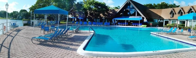 3740 Inverrary Dr Unit 3D, Lauderhill, FL 33319 - community pool with a patio area