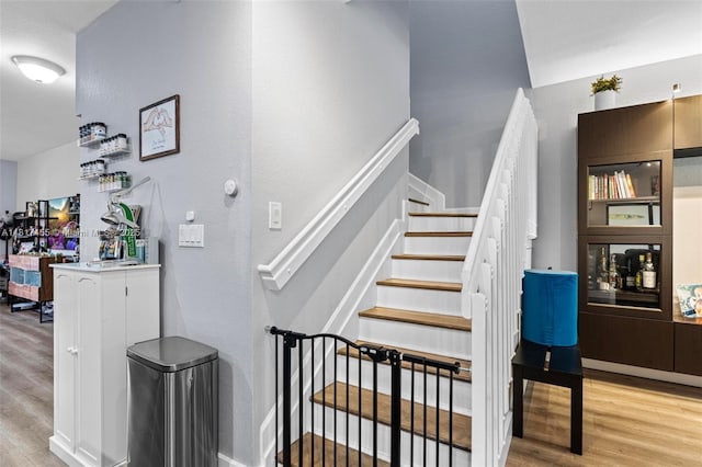 22791 SW 88th Pl, Cutler Bay, FL 33190 - stairway with wood finished floors and baseboards