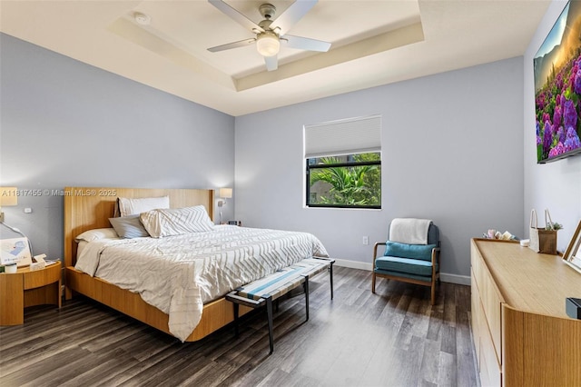 22791 SW 88th Pl, Cutler Bay, FL 33190 - bedroom with a raised ceiling, wood finished floors, baseboards, and ceiling fan