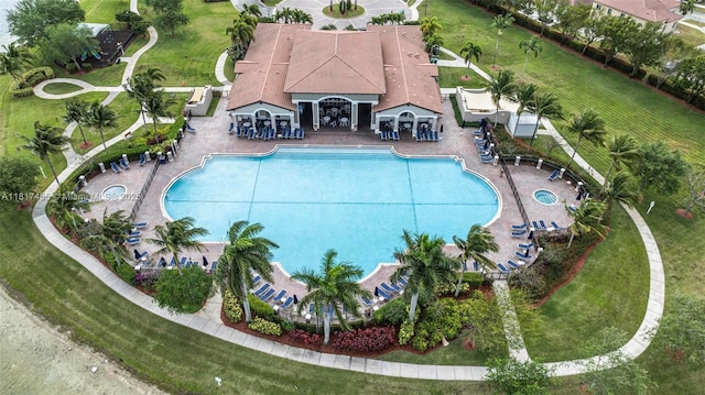 22791 SW 88th Pl, Cutler Bay, FL 33190 - community pool featuring a patio and a lawn