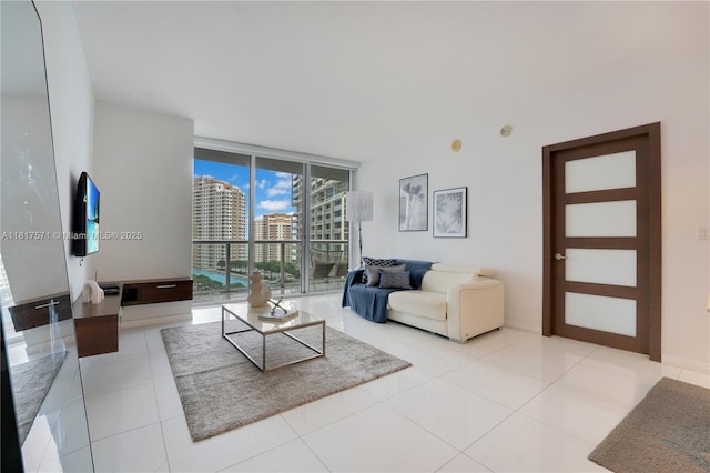 485 Brickell Ave Unit 1801, Miami, FL 33131 - living area with floor to ceiling windows and tile patterned flooring