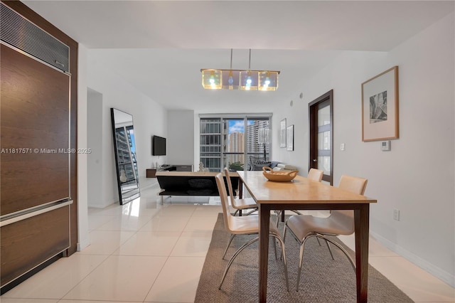 485 Brickell Ave Unit 1801, Miami, FL 33131 - dining room featuring light tile patterned floors
