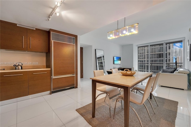 485 Brickell Ave Unit 1801, Miami, FL 33131 - dining space with light tile patterned flooring and track lighting