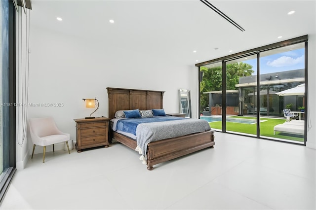 1845 NE 124th St, North Miami, FL 33181 - bedroom with access to outside, expansive windows, and recessed lighting