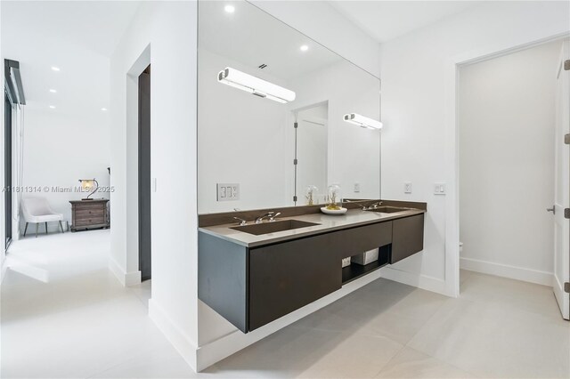 1845 NE 124th St, North Miami, FL 33181 - full bathroom with double vanity, recessed lighting, and baseboards