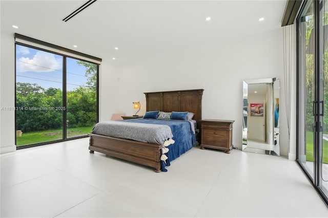 1845 NE 124th St, North Miami, FL 33181 - bedroom with multiple windows, expansive windows, access to outside, and recessed lighting